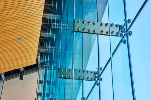 Modern architectural detail: glass facade and wooden paneling at Grand Wayne Convention Center, Indiana.