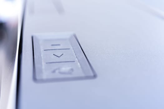 Denver, Colorado, USA-May 5, 2024-This image captures a close-up view of the control buttons used for operating the tailgate and tonneau cover of a Tesla Cybertruck, highlighting the futuristic and functional design elements.