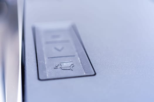 Denver, Colorado, USA-May 5, 2024-This image captures a close-up view of the control buttons used for operating the tailgate and tonneau cover of a Tesla Cybertruck, highlighting the futuristic and functional design elements.