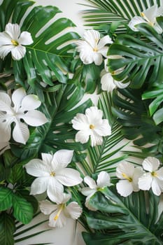A close up of a bunch of white flowers and green leaves.