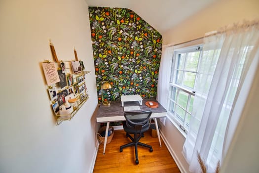 Bright, floral home office in Fort Wayne, featuring a modern desk and natural light, perfect for productivity and style.