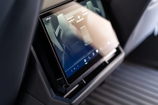 Denver, Colorado, USA-May 5, 2024-This image captures the sophisticated rear seat screen interface in the Tesla Cybertruck, highlighting the vehicle cutting-edge technology and user-friendly features, offering passengers control and comfort during their journey.