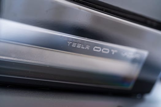 Denver, Colorado, USA-May 5, 2024-This image features a detailed view of the Tesla Cybertruck front light bar, highlighting the sleek design and advanced lighting technology. The chrome finish adds a modern touch, reflecting Tesla commitment to futuristic and functional vehicle design.