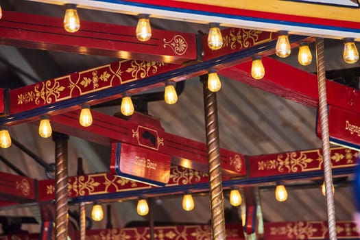 Vintage elegance on display at Fort Wayne Children's Zoo with ornate carousel details, glowing lights, and artistic craftsmanship.