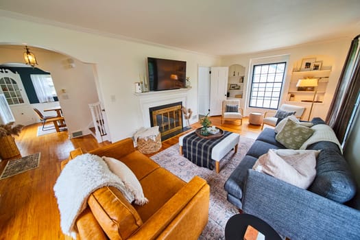 Elegant living room in Fort Wayne home for sale, featuring modern and traditional elements, ideal for family comfort.