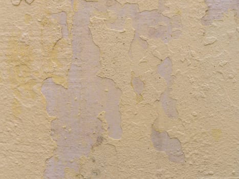 texture of old concrete wall with cracked paint close-up