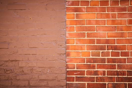 Contrasting brick walls in Fort Wayne, Indiana: smooth bricks meets rugged red in an urban setting.