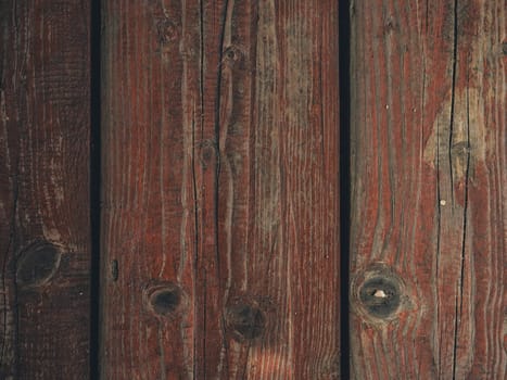 texture of wooden boards with cracked exfoliating old paint