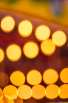 Golden bokeh lights capture the magic of a festive evening at Fort Wayne Children's Zoo.