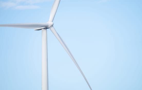 Wind energy. Wind power. Sustainable, renewable energy. Wind turbines generate electricity. Wind farm. Sustainable resources. Sustainable development. Green technology for energy sustainability.