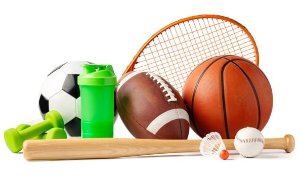 Assorted sports equipment isolated on white background close up