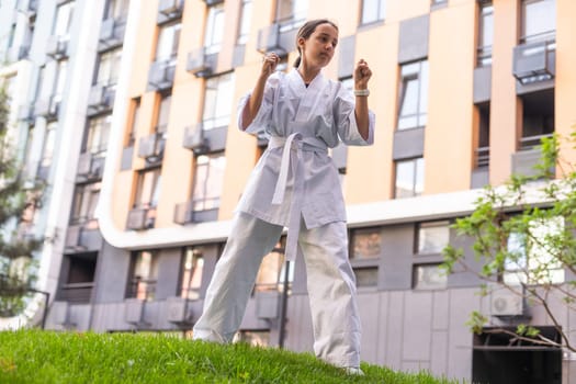 Girl in Karate Taekwondo Fighting Stance. High quality photo