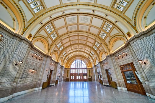 Sweeping arches and stained glass illuminate Baker Street Station's historical grandeur, Fort Wayne.