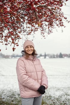 Winter Elegance: Portrait of a Beautiful Girl in a Snowy European Village