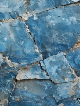 Close-up view of a surface covered with various shapes and sizes of stones embedded in it