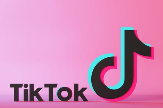 Leipzig, Germany - 15-05-2024: vibrant 3D rendering of Tik Tok logo against pink gradient background, perfect for social media themes and digital marketing content with ample copy space. Tiktok. 3D