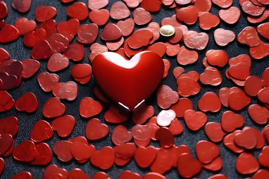 A background filled with a multitude of small red hearts, with one large heart in the center, representing love and affection.