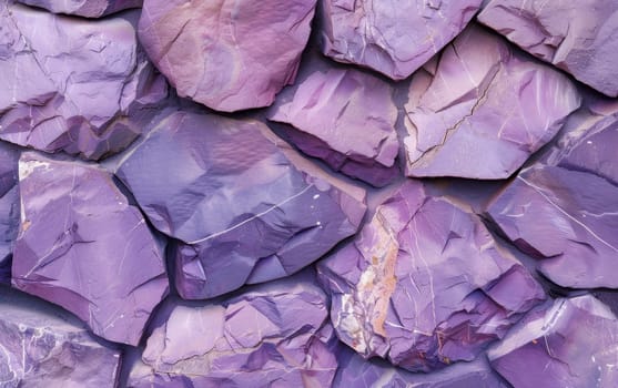 Layered purple stone cladding with varied shapes and a rough, textured appearance