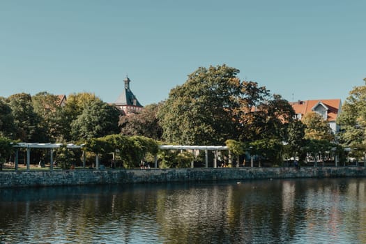 On An Old European City Bietigheim-Bissingen In Germany. the City Park of Bietigheim-Bissingen, Baden-Wuerttemberg, Germany, Europe. Autumn Park and house