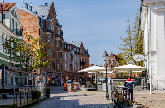 Street, Central square in the ancient city on as sunny summer day. Ystad, Sweden - May 14, 2024