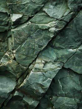 Overlapping green stone shards form a dense mosaic texture