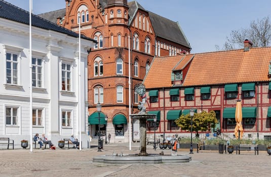 Street, Central square in the ancient city on as sunny summer day. Ystad, Sweden - May 14, 2024
