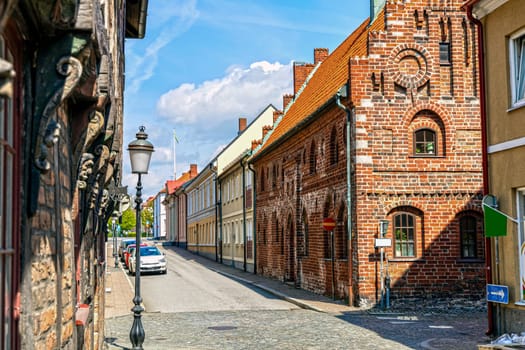 Narrow streets of the old town with colorful houses Ystad, Sweden.