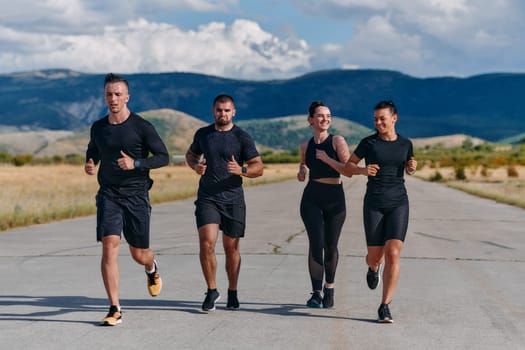 A professional athletic team as they train rigorously, running towards peak performance in preparation for an upcoming marathon.