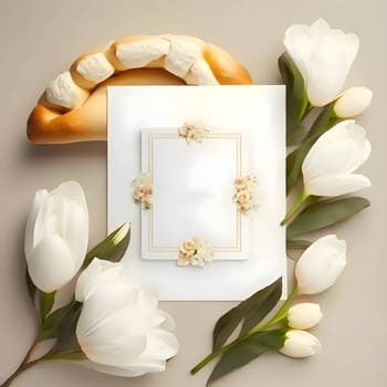 An overhead view of a blank white card with scattered flowers around it.