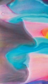 Abstract pastel marbled background with swirls in blue, yellow, and pink hues. Luxury liquid wave of grunge material, elegant wallpaper design.