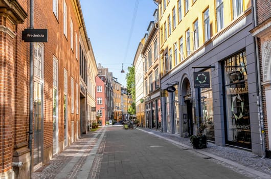 Downtown Copenhagen with old colored houses on a sunny day. Copenhagen, Denmark - September 30, 2023