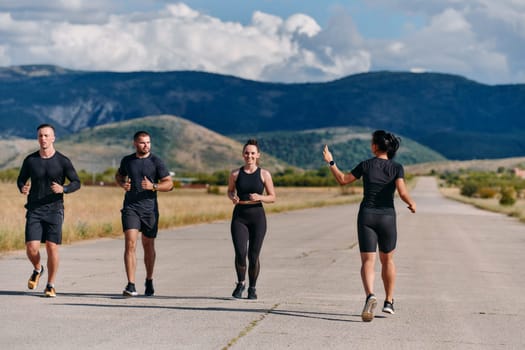 A professional athletic team as they train rigorously, running towards peak performance in preparation for an upcoming marathon.