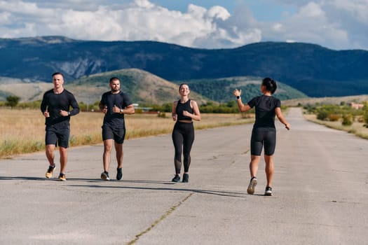 A professional athletic team as they train rigorously, running towards peak performance in preparation for an upcoming marathon.