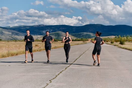 A professional athletic team as they train rigorously, running towards peak performance in preparation for an upcoming marathon.