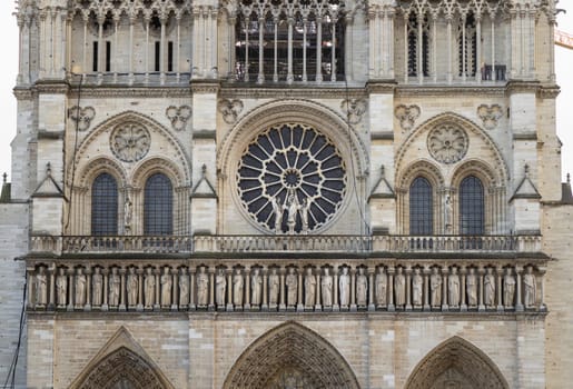 France, Paris - Jan 03, 2024 - Exterior architecture of Famous Notre Dame de Paris cathedral. UNESCO World Heritage Site, View of Gothic church, Space for text, selective focus.