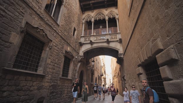 Bridge between buildings in Barri Gotic quarter of Barcelona, Spain.