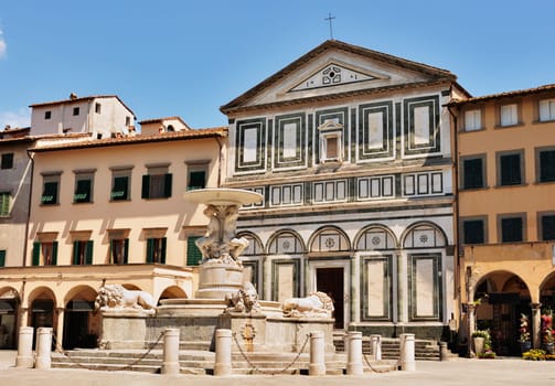 Empoli ,  Tuscany , Farinata degli Uberti square with the fountain  and the Collegiata di Sant'Andrea church 