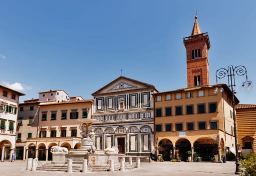 Empoli ,  Tuscany , Farinata degli Uberti square with the fountain and the Collegiata di Sant'Andrea church 