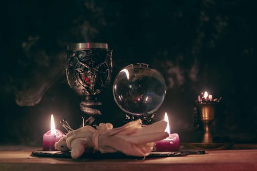 Mysterious Occult Ritual Setup with Crystal Ball and Candles