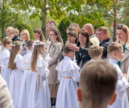 05.05.2024 - Brest, Belarus - People gathered for first communion mass at Roman catholic church.