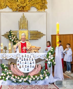 05.05.2024 - Brest, Belarus - People gathered for first communion mass at Roman catholic church.