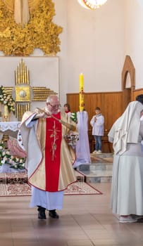 05.05.2024 - Brest, Belarus - People gathered for first communion mass at Roman catholic church.