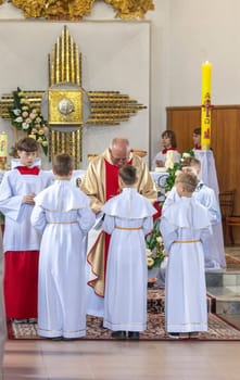 05.05.2024 - Brest, Belarus - People gathered for first communion mass at Roman catholic church.