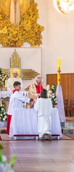 05.05.2024 - Brest, Belarus - People gathered for first communion mass at Roman catholic church.