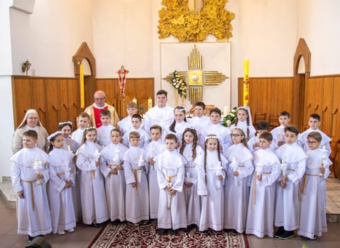 05.05.2024 - Brest, Belarus - People gathered for first communion mass at Roman catholic church.