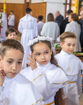 05.05.2024 - Brest, Belarus - People gathered for first communion mass at Roman catholic church.