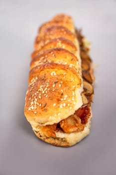 sandwich in a fresh crispy bun with filling.