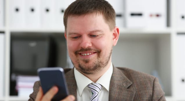 Handsome smiling businessman talk cellphone in office portrait. Stay in touch solution negotiate meeting job white collar busy life style electronic device store professional training concept