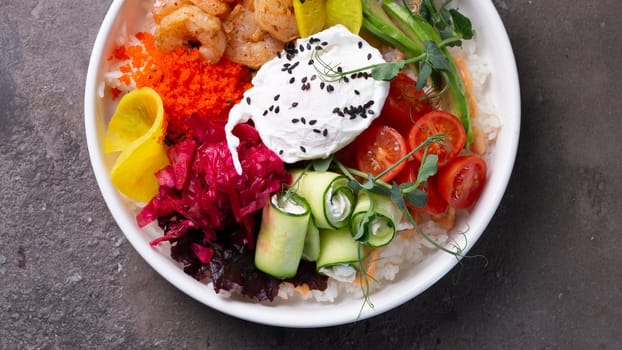A delicious and healthy seafood rice bowl filled with fresh vegetables, egg, and tasty dressing. Perfect for a quick and easy meal.