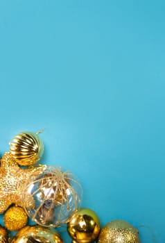 golden Christmas toys on a blue background.